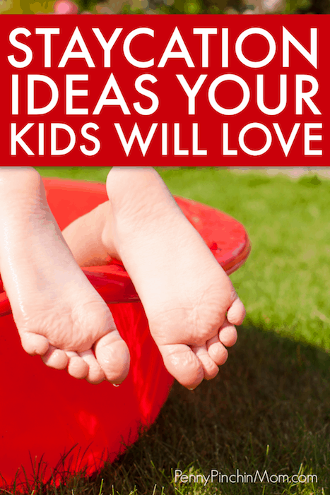 staycation idea child's feet in a red swimming pool